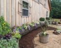 All through our grounds you can find touches of beauty like our stunning floral displays and landscaping near the barn. 